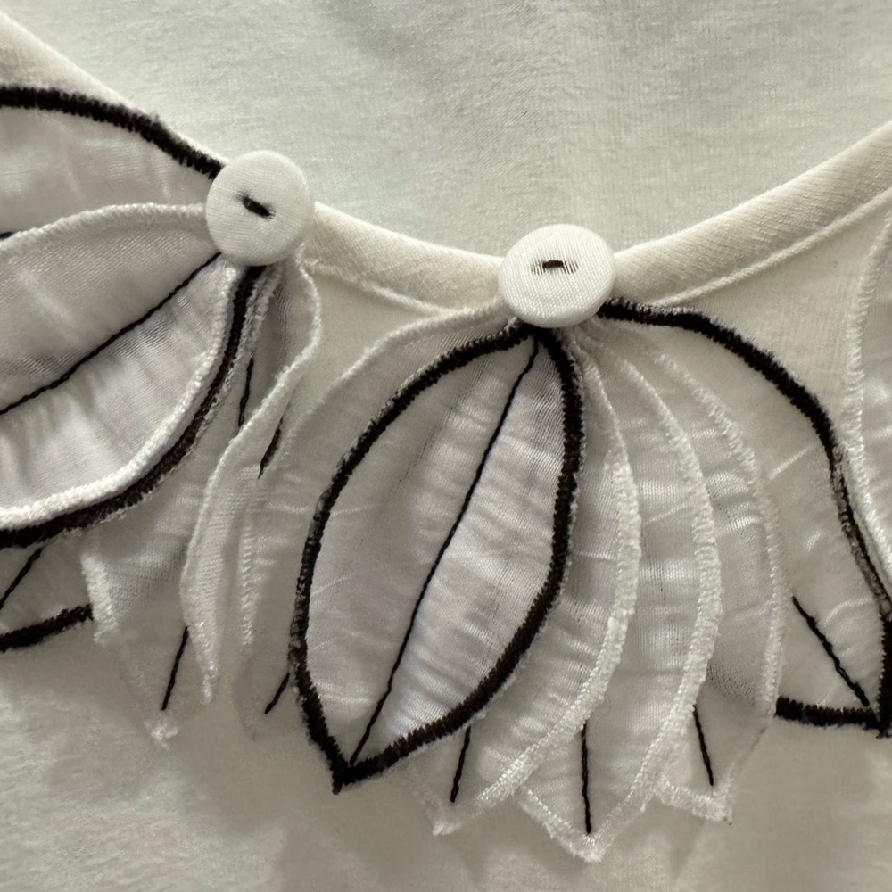 ZoZo brand
Embellished White Blouse with Black Accents